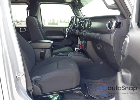 2023 Jeep Wrangler 4Xe 4-Door Rubicon from USA, damaged, VIN 1C4JJXR69PW552265